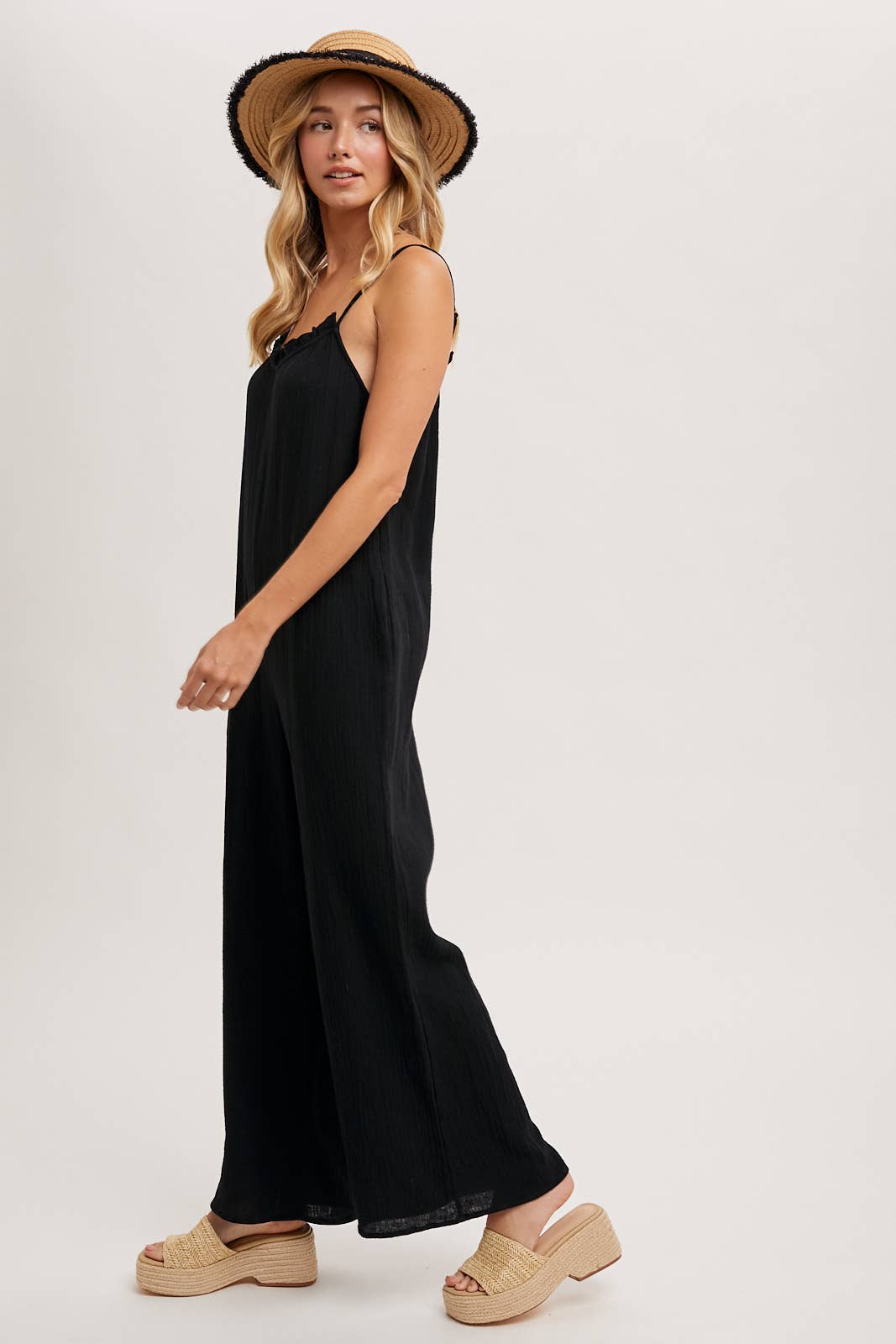 SLEEVELESS SCOOP BACK RUFFLED NECKLINE JUMPSUIT: Black