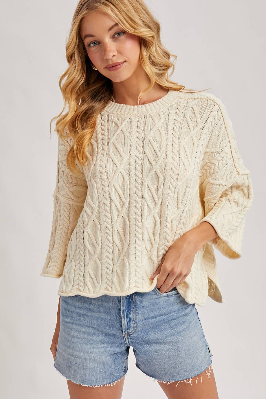 OVERSIZED BELL SLEEVE CABLE KNIT SWEATER: CREAM