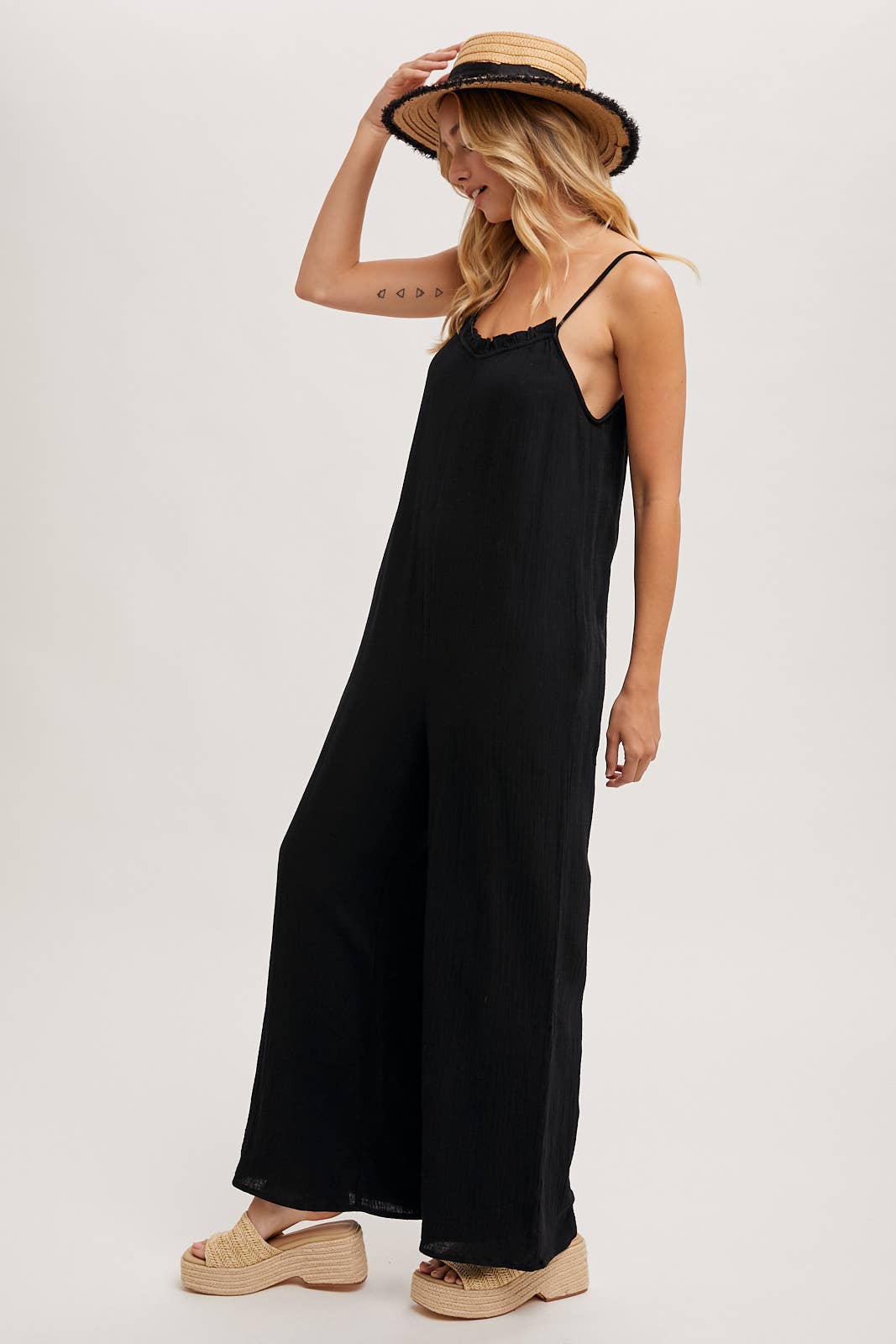 SLEEVELESS SCOOP BACK RUFFLED NECKLINE JUMPSUIT: Black
