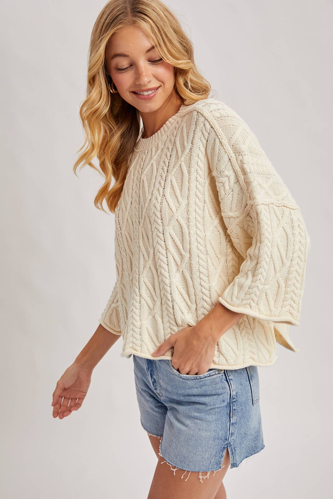 OVERSIZED BELL SLEEVE CABLE KNIT SWEATER: CREAM