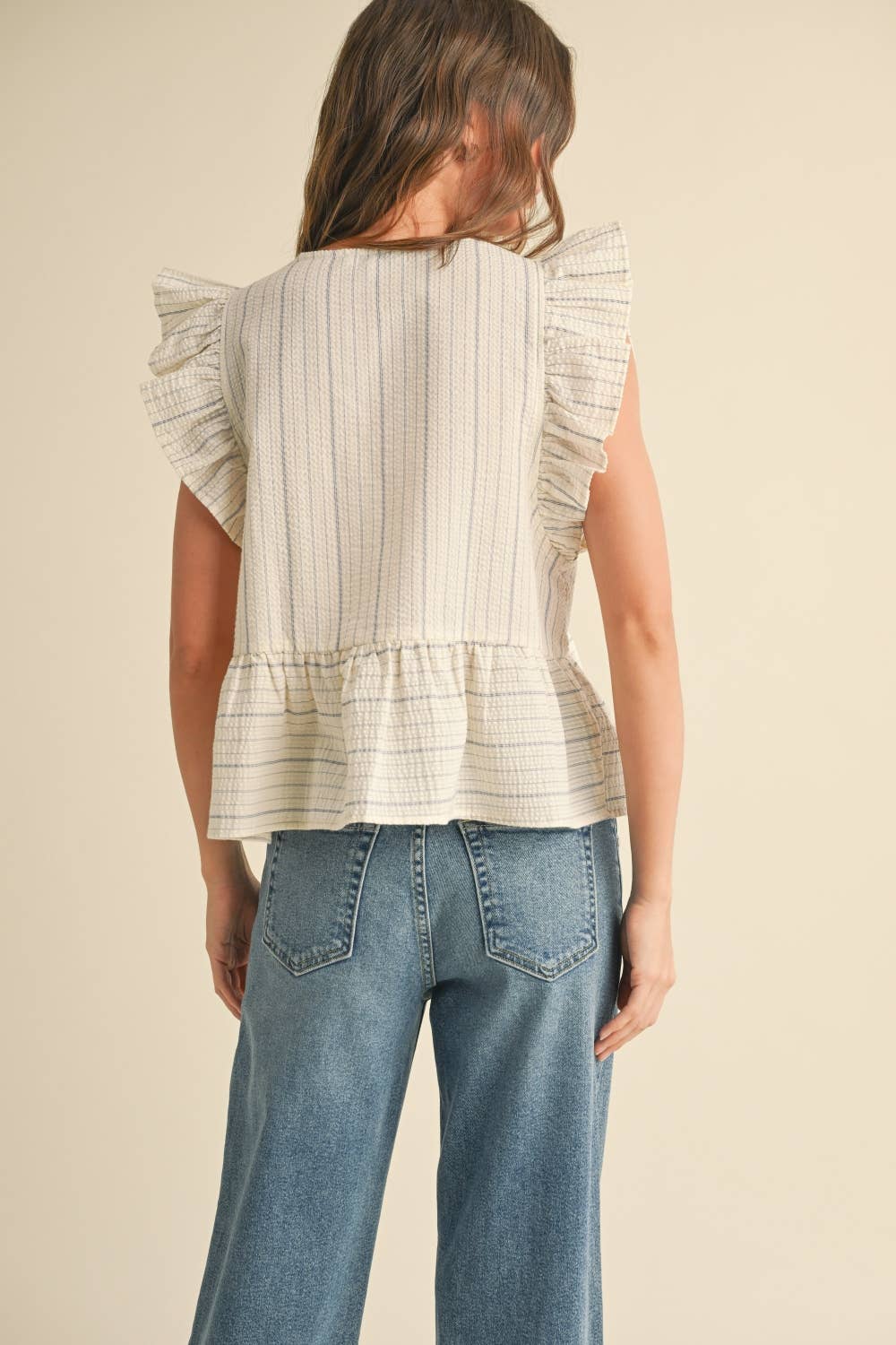 STRIPED WITH TIE FRONT RUFFLE SLEEVELESS BLOUSE: BLUE