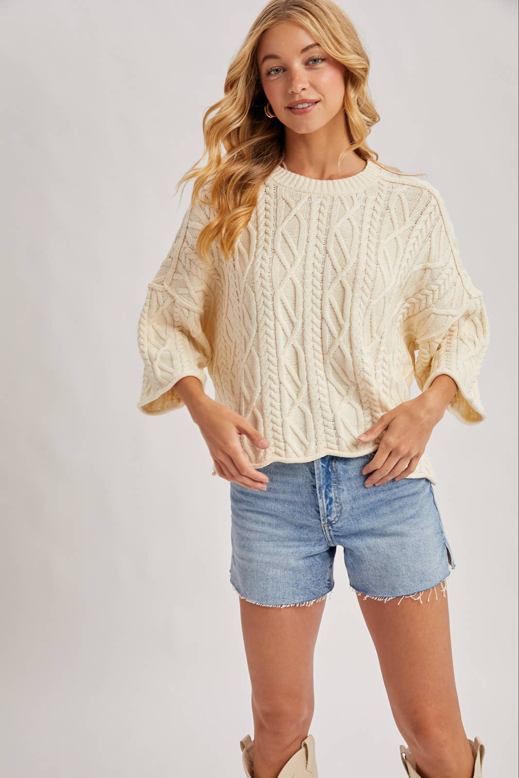 OVERSIZED BELL SLEEVE CABLE KNIT SWEATER: CREAM