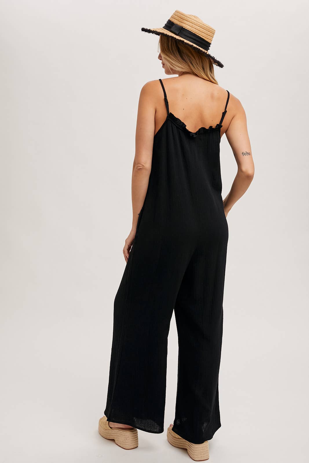 SLEEVELESS SCOOP BACK RUFFLED NECKLINE JUMPSUIT: Black