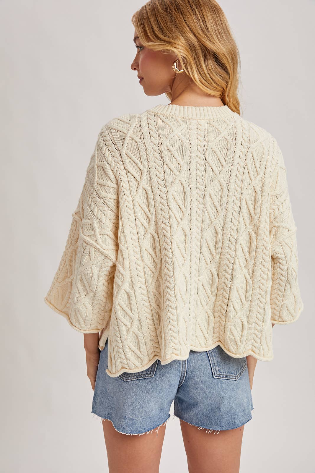 OVERSIZED BELL SLEEVE CABLE KNIT SWEATER: CREAM